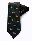 Black polyester tie with repeating brown dachshund dog pattern, wrinkle-resistant and stylish for dog lovers.