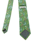 Golden Lily Verdant men's tie with intricate floral pattern and green background, showcasing pale blue and red details.