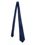 Classic herringbone polka dot silk tie in navy, showcasing luxurious texture and elegant design.