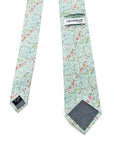 Golden Lily Sage men's tie featuring a botanical pattern in soft sage green with floral motifs and elegant design.