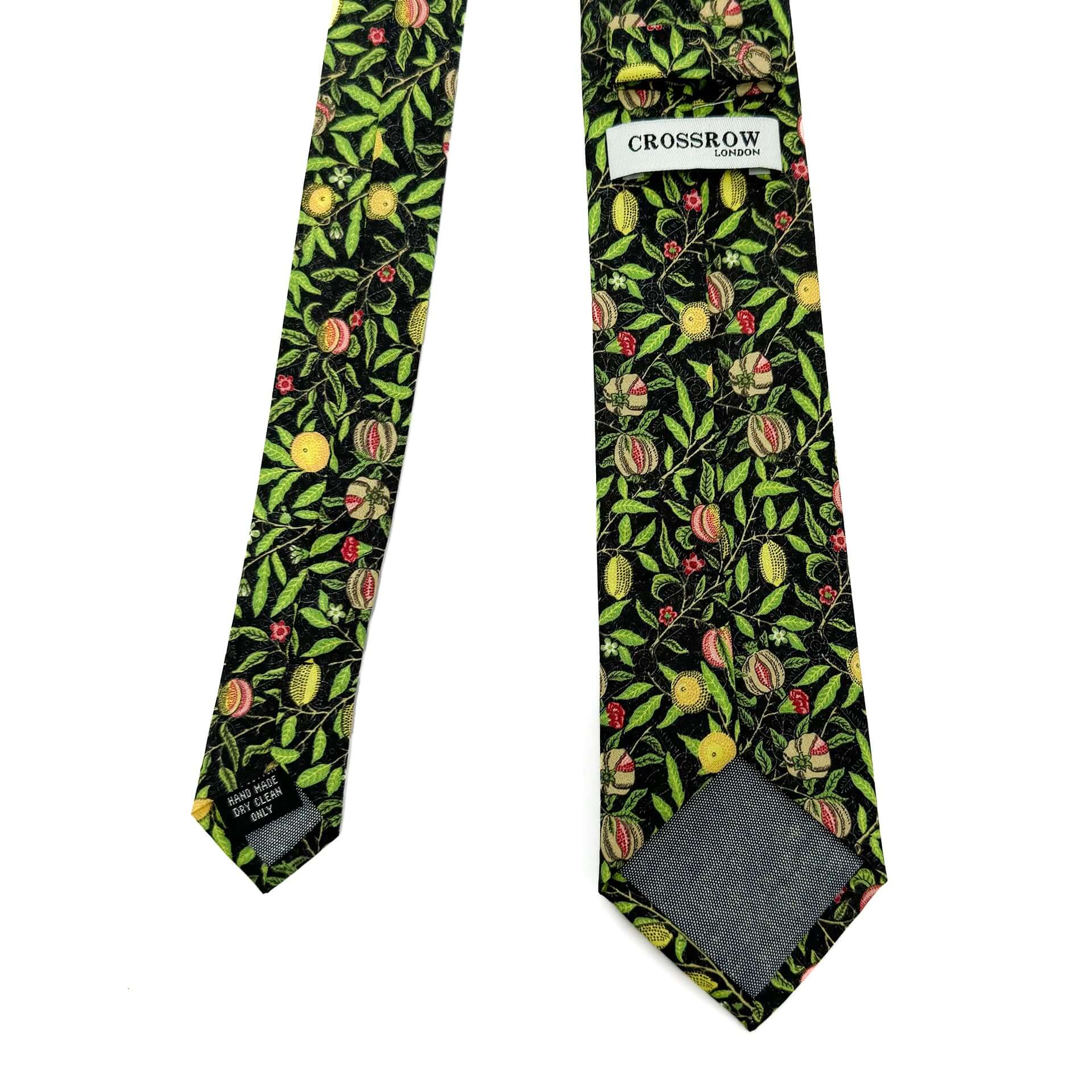 Pomegranate Noir men's tie featuring black and green botanical design with golden fruits, perfect for heritage-inspired fashion.