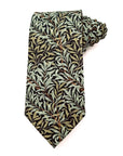 Willow Noir men's tie featuring intricate green leaves on a black background, ideal for formal events and smart-casual looks.