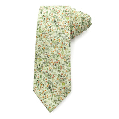 Amberwild Bloom Cotton Tie with delicate orange and yellow blossoms on green foliage, breathable cotton for summer events.