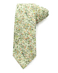 Amberwild Bloom Cotton Tie with delicate orange and yellow blossoms on green foliage, breathable cotton for summer events.
