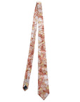 Alt text: "Autumn Fern men's tie featuring a floral design in shades of orange, cream, and yellow, perfect for adding a seasonal touch to formal or casual outfits."