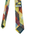 Camden Block tie with vibrant patchwork of ochre, rust, sage, and blue hues made from cotton.