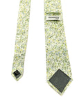Wildflower Whisper men's tie with cream base and botanical details in soft greens, yellows, and blues.