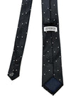 Black polka dot jacquard silk tie with white dots, made of 100% pure silk, ideal for formal and casual occasions.