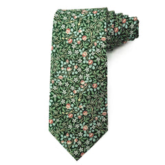 Deep green cotton tie with intricate white blossoms and red clover floral pattern for elegant formalwear.
