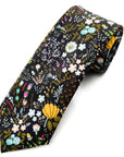 Floral cotton tie with mustard, lilac, blue, and blush blooms on black background for elegant formalwear.