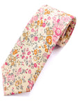 Cotswold Bloom - Tie with pink, orange, and yellow floral pattern on a beige background inspired by English countryside.