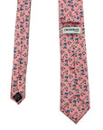 Pink polyester tie with playful white sheep and blue flowers pattern, whimsical and charming accessory for fun occasions
