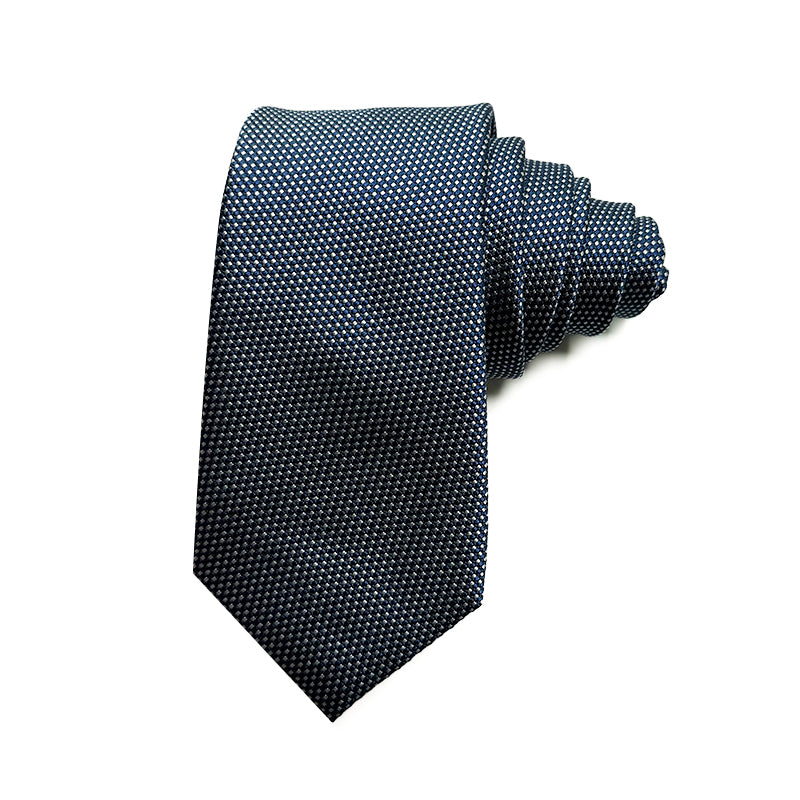 Midnight Blue men's jacquard silk tie featuring a classic white polka dot pattern on a deep blue background.