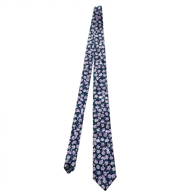 Lilac Grove tie with delicate lilac flowers on a deep navy background.