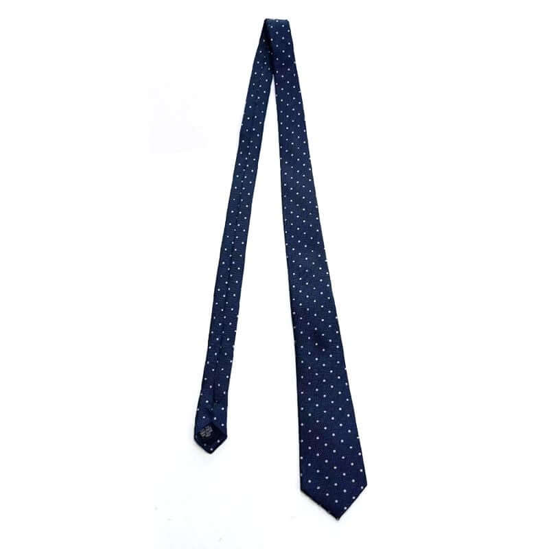 Classic herringbone polka dot silk tie in navy, showcasing luxurious texture and elegant design.
