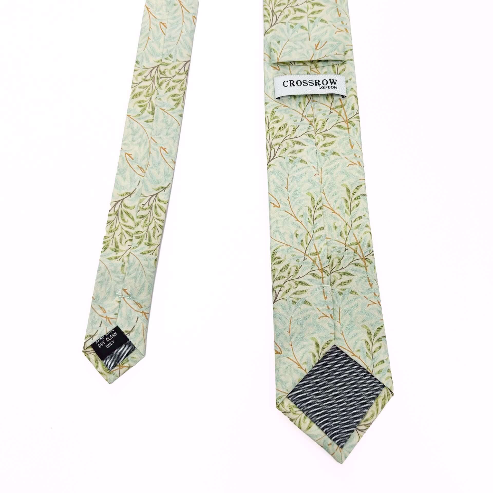 Willow Mist Men&#39;s Tie featuring a pastel sage and cream design with flowing leaf motifs, handcrafted from breathable cotton.
