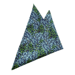 Willow Azure pocket square with navy background and vibrant blue-green leaf pattern, perfect for formal or business attire.