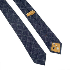 Charcoal grid pattern wool tie with floral contrast tip, perfect for autumn and winter wardrobe.