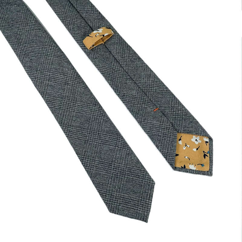 Glen Check Wool Tie showcasing iconic glen check pattern with floral contrast detail for a luxurious, polished look.