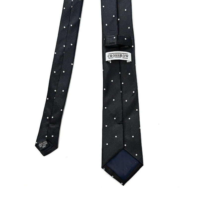 Black polka dot jacquard silk tie with white dots, made of 100% pure silk, ideal for formal and casual occasions.