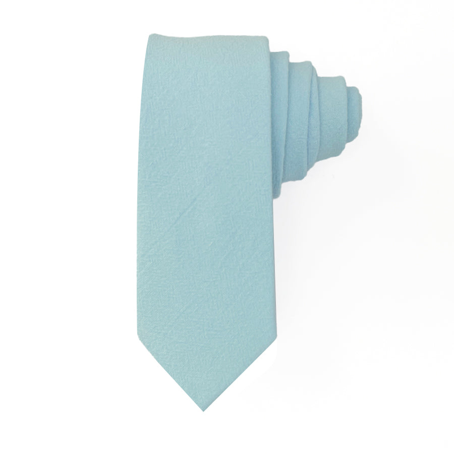 Light blue tie, 3" wide, 58" long, 100% cotton.