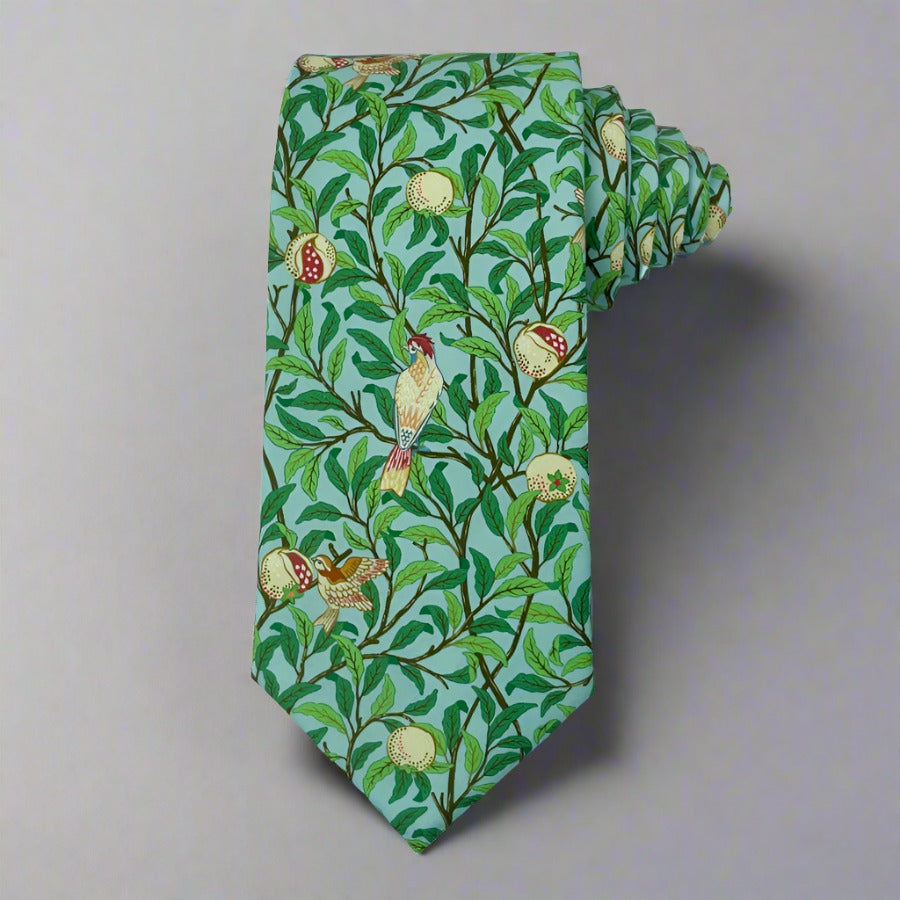 William Morris tie with green foliage and bird design, 3" wide, 58" long, 100% cotton.