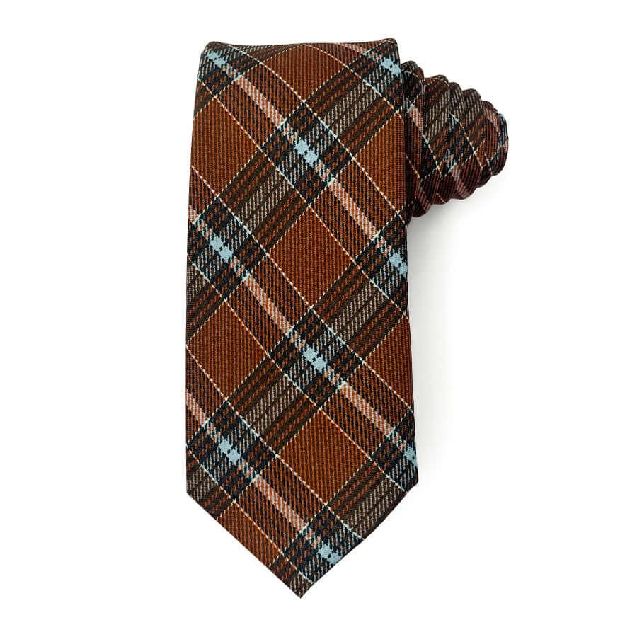 Highland Charm plaid tie with rich earthy tones, featuring a classic pattern.