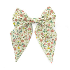 Girl's Floral Meadow Bow Tie, featuring colorful flowers on a pastel background