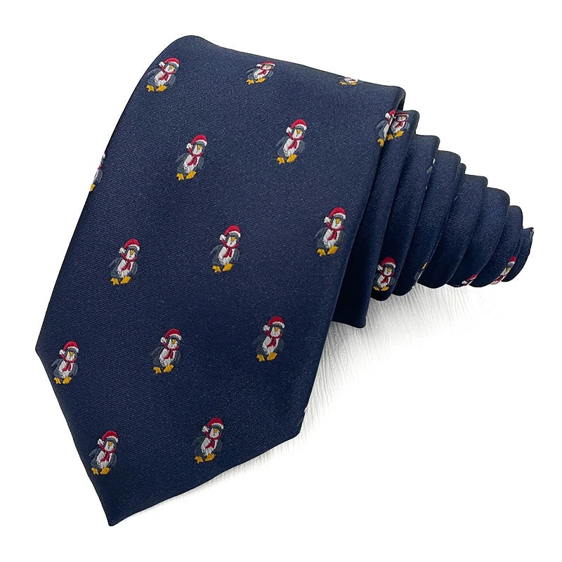 Santa Penguin Navy Christmas tie - navy polyester tie woven with penguins in red Santa hats and scarves