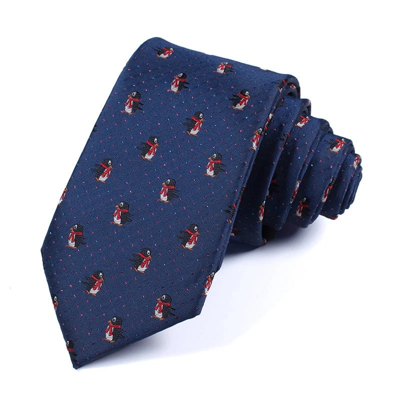 Skating Penguins Navy Christmas tie - navy polyester tie woven with red-scarfed skating penguins and a snowfall pindot ground