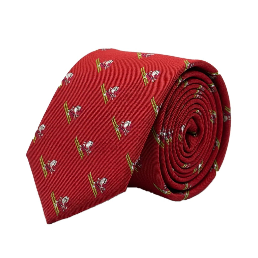 Skiing Santa Red Christmas tie rolled up - red polyester tie woven with Father Christmas on green skis